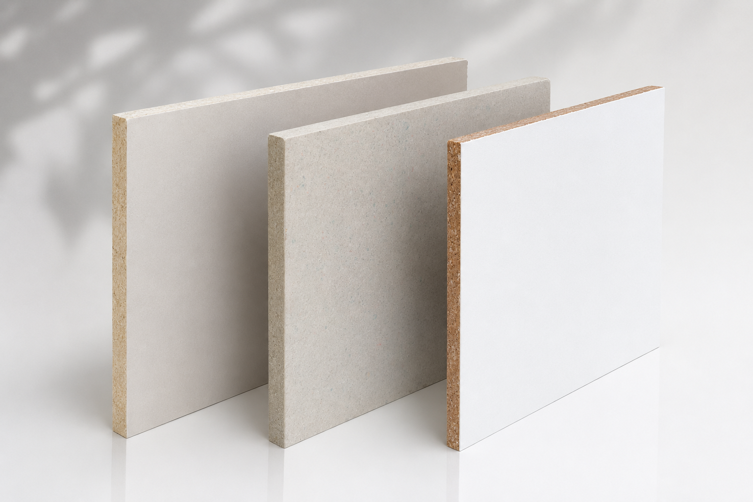Three Future Earth Composites recycled composite boards with varied surface finishes